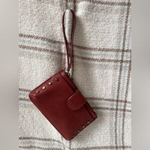 small burgundy wristlet
